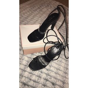 Black block heel with transparent strap